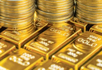 Gold slips to its lowest level since August 1 as the U.S. dollar strengthens, while investors eye the Federal Reserve’s next move.
