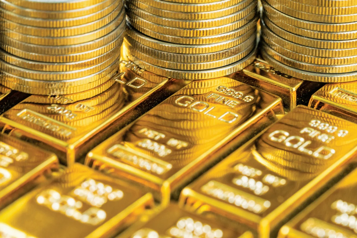 Gold slips to its lowest level since August 1 as the U.S. dollar strengthens, while investors eye the Federal Reserve’s next move.