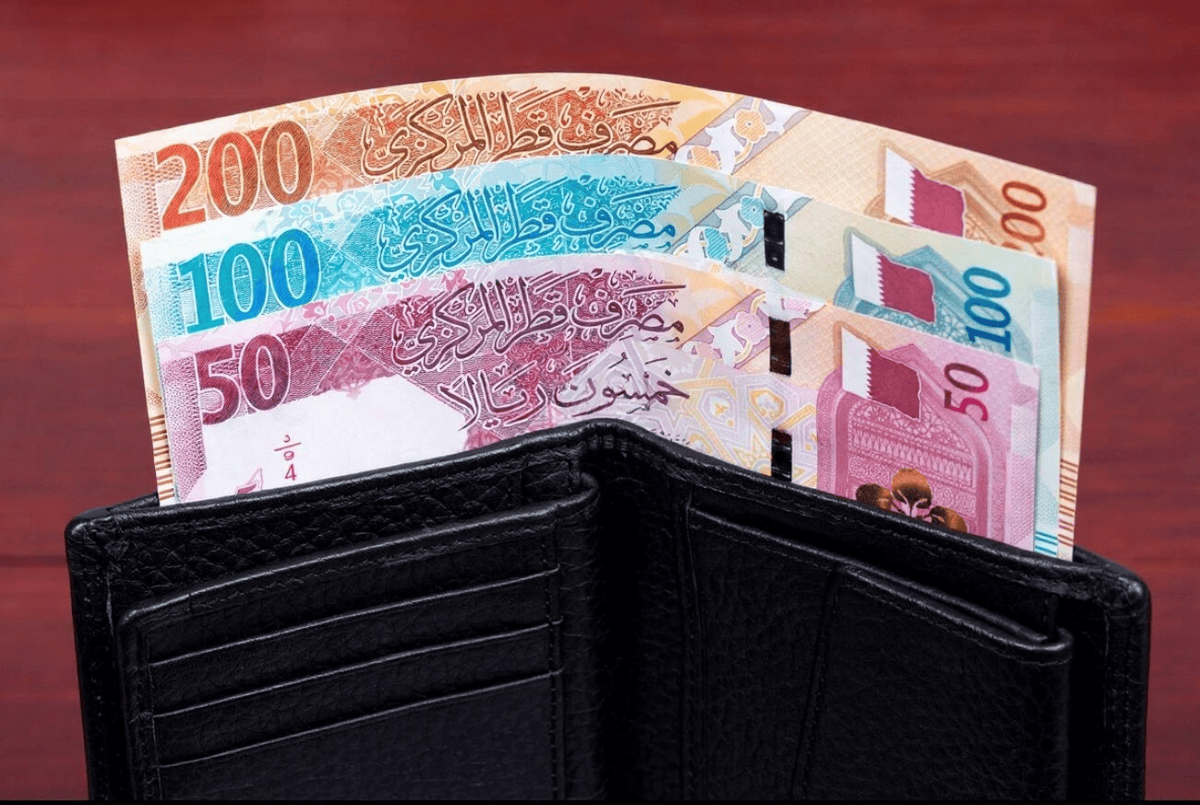 Qatari Riyal currency notes showcasing traditional heritage, modern landmarks, and security features issued by Qatar Central Bank.